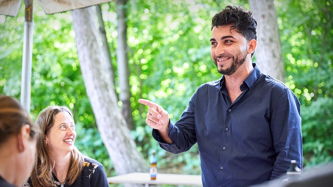 Roberto Santovito und zwei Mitarbeitende